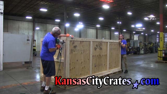 Crate builders assemble knock down style of crate at automotive parts manufacture