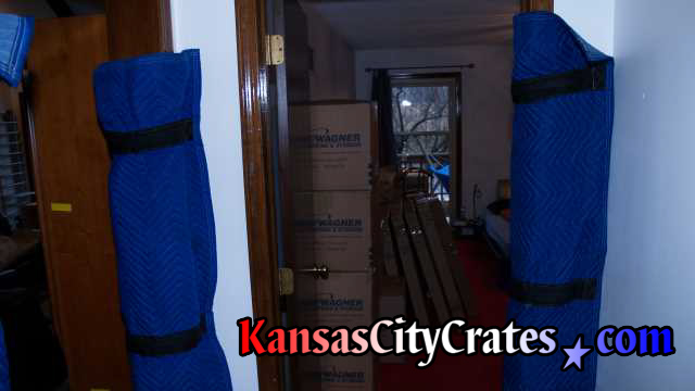 Jambguards are special furniture blankets designed to clamp on door jambs to protect them while moving crates
