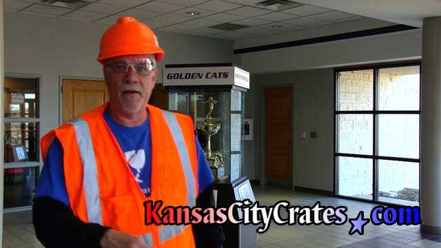 Kansas City Crates safety compliance officer speaking with crate builder during rennovation project in Manhattan Kansas