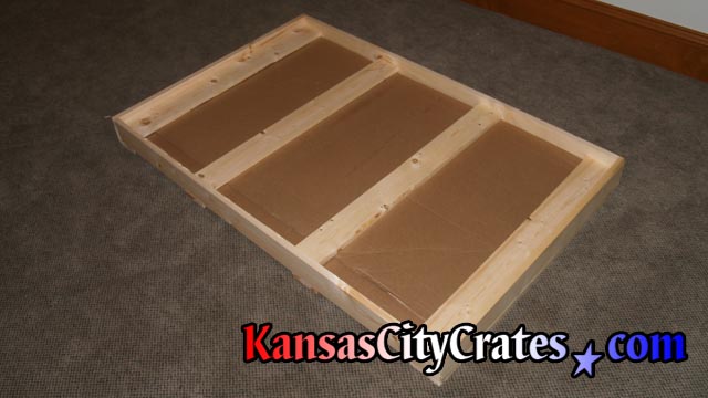 Slate in crate with foam lining and cardboard sides to protect it during transport.