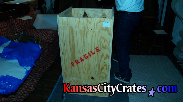Indextructible box crate on blanket for héraut d'armes bronze statue at mansion in Kansas City MO