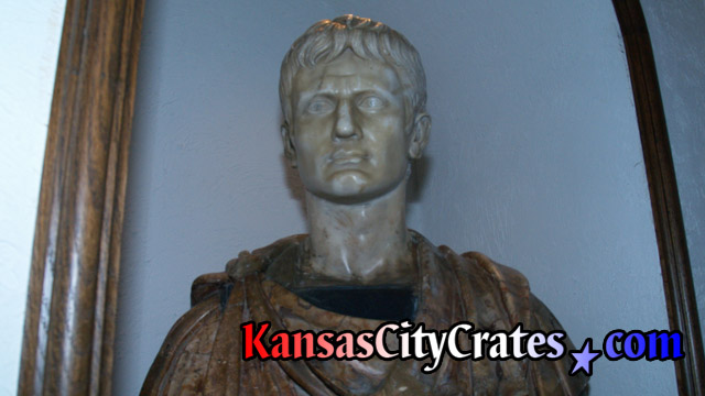 Marble bust sculpture of Imperator Caesar Divi F. Augustus from the movie set of Cleopatra starring Elizabeth Taylor and Richard Burton at mansion in Kansas City before packing into Indestructible box crate.