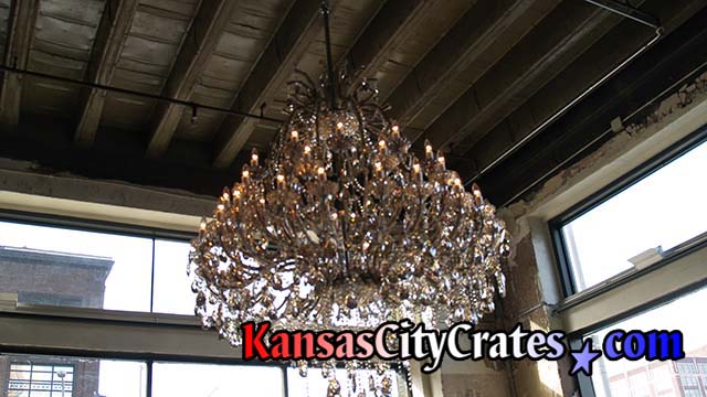 Removing large crystal chandelier to ship