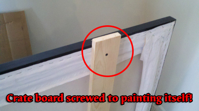 crate board screwed to painting itself