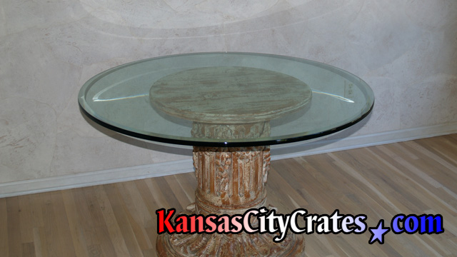 Thick round glass coffee table top before packing and crating.