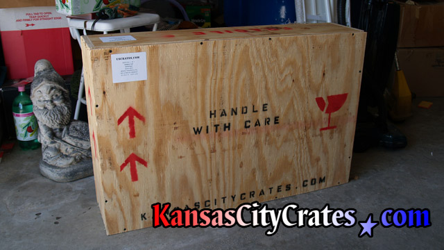 Wooden crate labeled for transport.