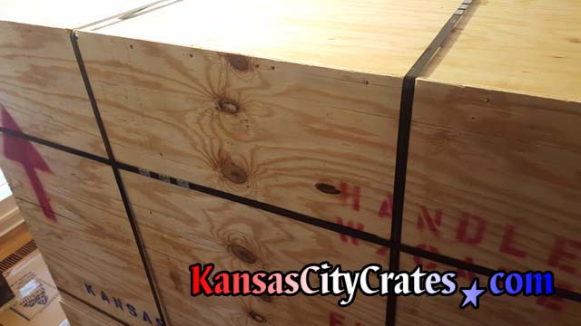 International solid wall crate is reinforced with steel banding