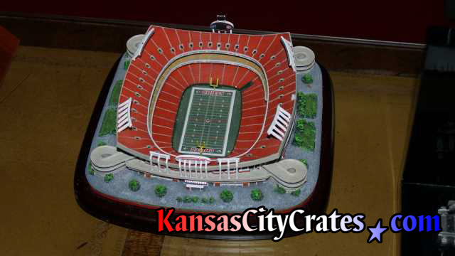 Packing for crate small scale model of Arrowhead Stadium in Kansas City.