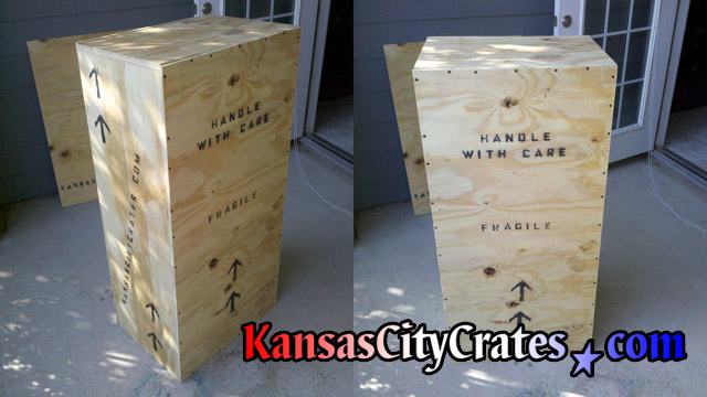 Two views of export crate with replica marble statue of Christ The Redeemer