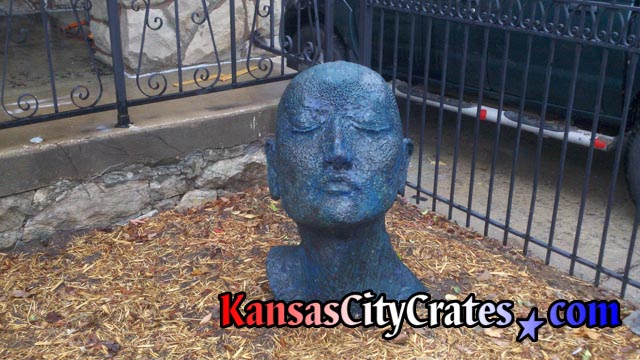 Statue near Kansas City Art Institute named A Fit of Sullenness to be packed in export crate for transport.