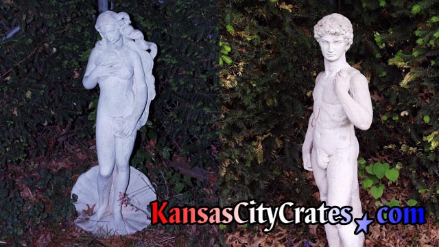 Concrete statues of Venus & David in garden by pool before crating.