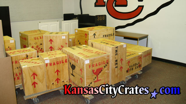 23 indestructible wood box crates sitting on carts in tunnel at Arrowhead Stadium in Kansas City MO