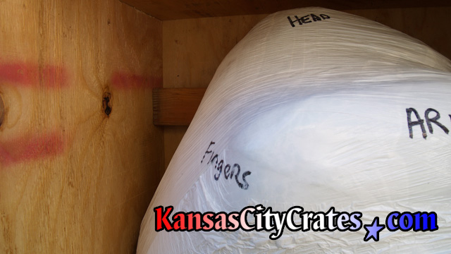 Odd shapes, sharp objects, or weak points of the item being crated will sometimes require the crater to add additional rigging or internal bracing to the crate to ensure the object arrives safely.