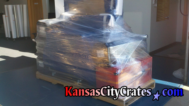 Custom pallet with trade show goods stretch wrapped in place for shipment to Las Vegas NV